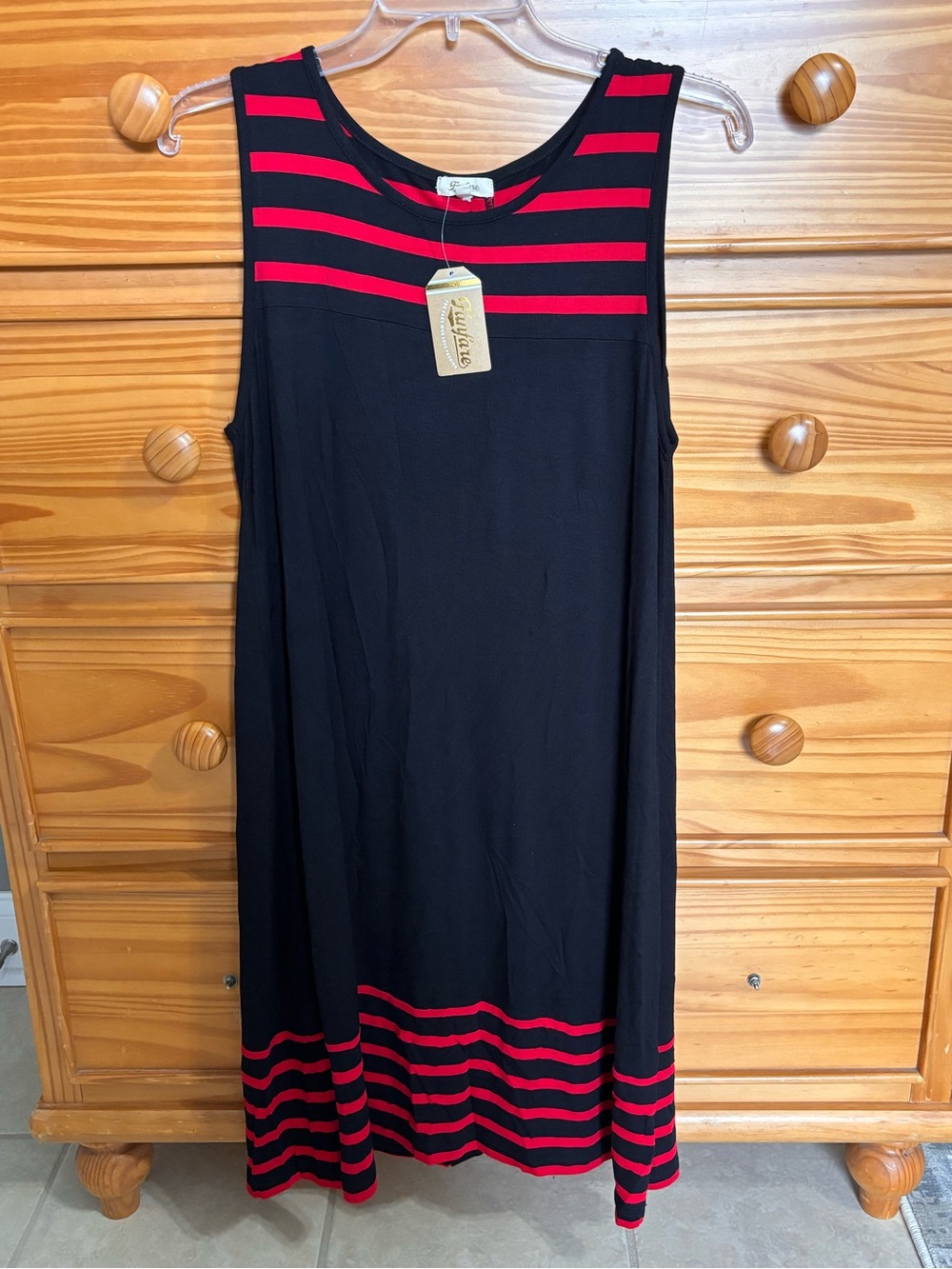 Sleeveless Black Dress with Red Stripe Accents by